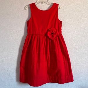 Vintage red cotton dress with beautiful flowers at the waist